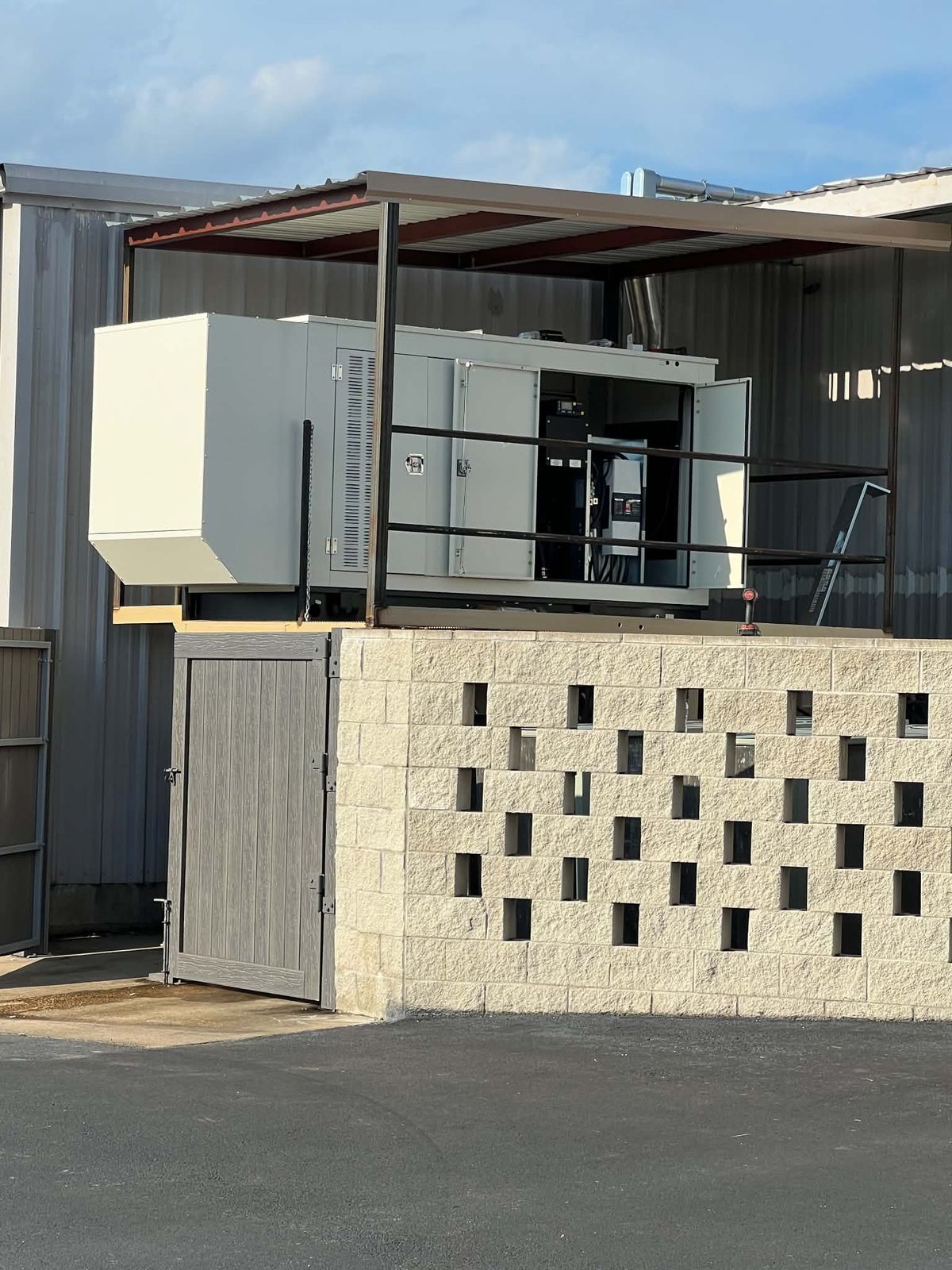 Commercial generator installed on an elevated platform
