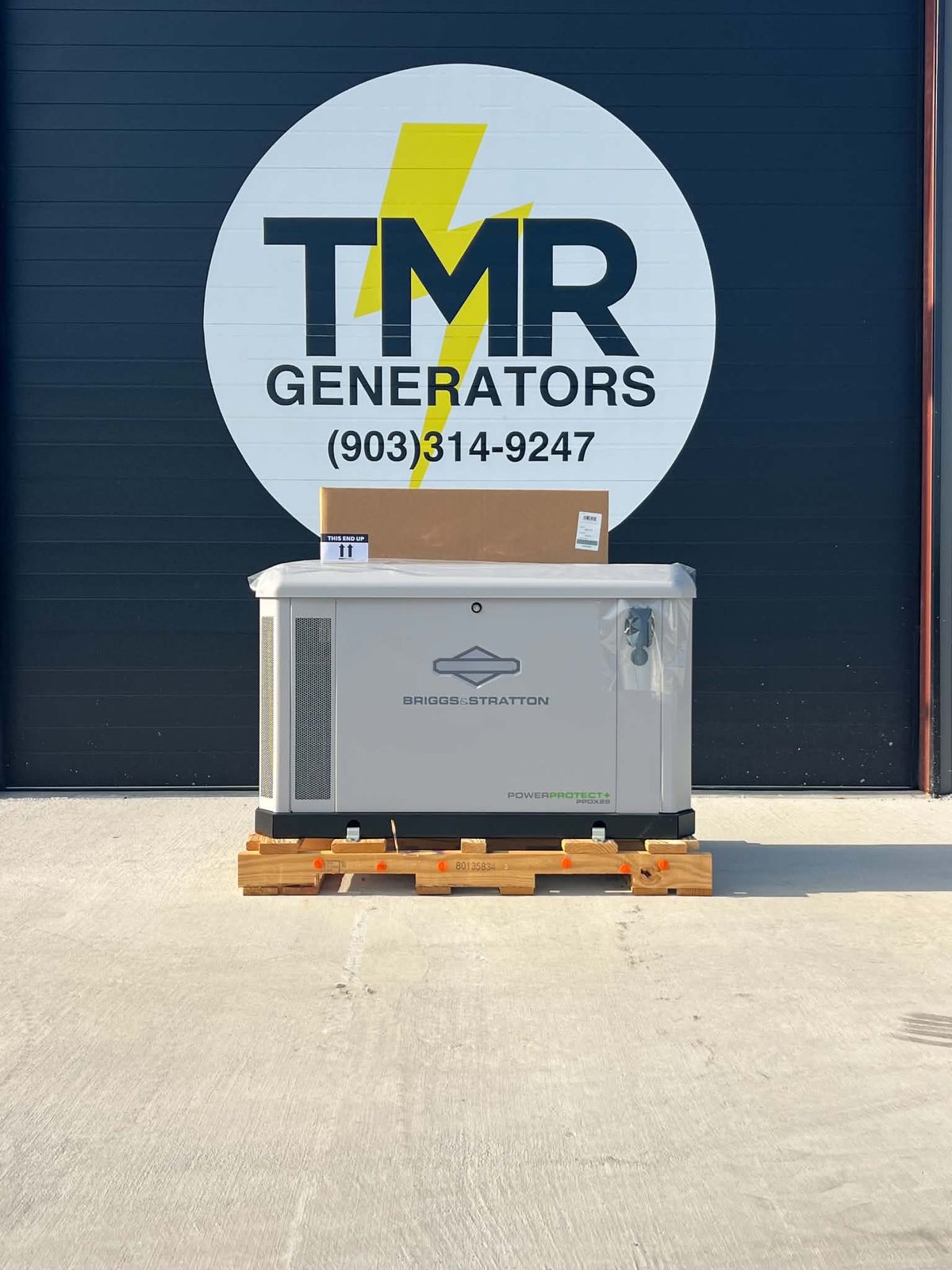 Briggs and Stratton generator in front of the TMR Generators logo