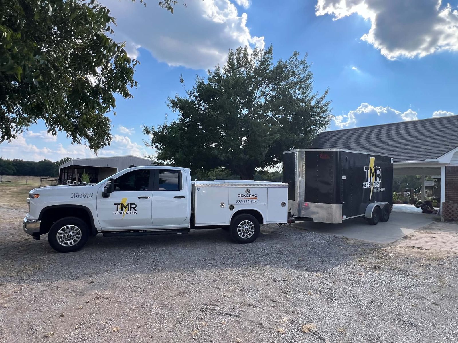 TMR Generators truck and trailer at a job site